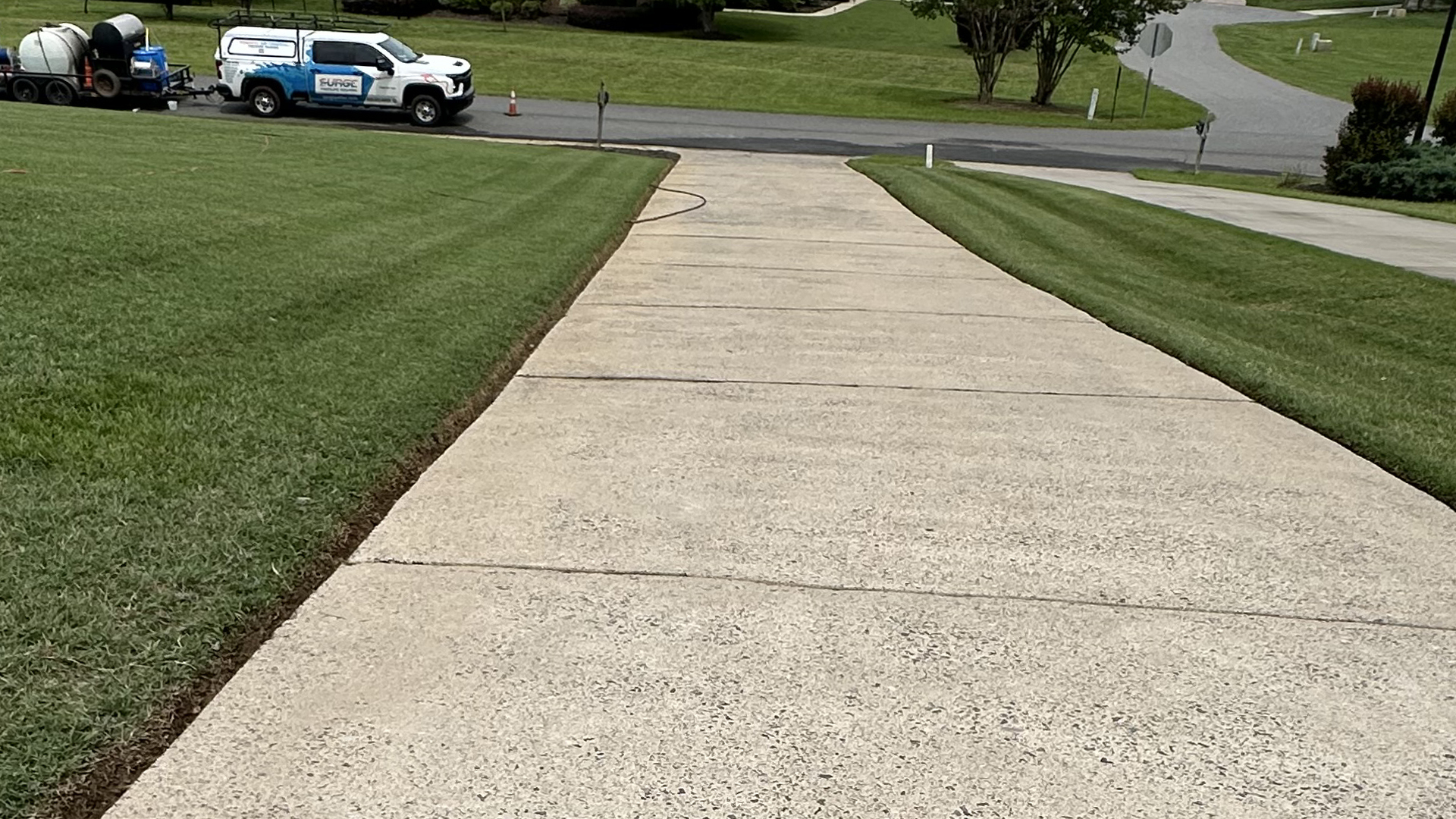 Surge Pressure Washing - Concrete Driveway Pressure Washing After Cleaning