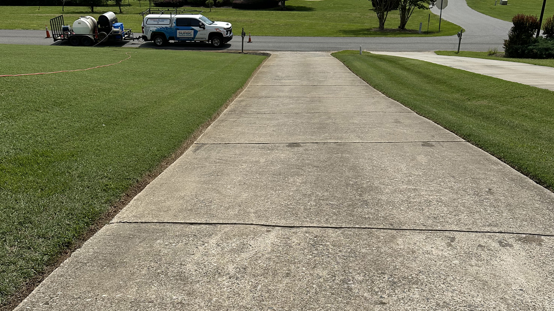 Surge Pressure Washing - Concrete Driveway Pressure Washing Before Cleaning